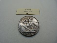 An 1895 Great Britain silver crown (LIX) Victoria with George and the Dragon to reverse