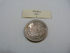 A Brazilian 1871 200 Reis coin (UNC)