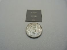 A 1951 German 5 Mark coin. 11.2g silver, AUNC, Eagle with 5 to reverse.