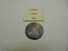 A Great Britain 1707 1 Shilling coin, silver AVF Anne with Coat of Arms to reverse