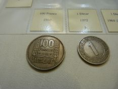 A Selection of Algerian coins from 1922, to include 100 Francs, 1 Centime, 1 Dinar, 1 Dinar, 5