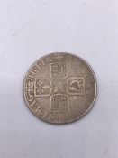 A Great Britain 1711 Shilling F, Silver, Anne with Four Shields to reverse