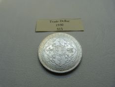 A Great Britain 1 Dollar UNC Britannia with Oriental Design, silver coin.