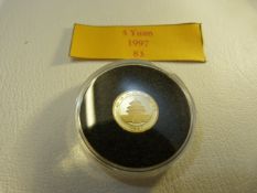 A 1997 Chinese 5 Yuan gold coin 1.6g (UNC)