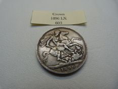 An 1896 Great Britain silver crown (LX) Victoria with George and the Dragon to reverse.
