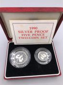 A 1990 Two coin Five Pence silver proof boxed set.