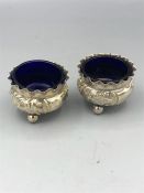 A Pair of silver salts with blue glass liners