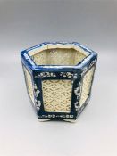 A Blue and white Chinese brush pot with pierced design.