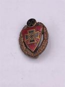 A WWII German 50 Year Veteran lapel badge.