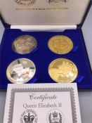 A Boxed set of 22ct gold plated and Sterling Silver plated coins by Tower Mint for Queen Elizabeth