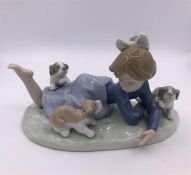 Lladro Figure of a girl playing with puppies (10cm)
