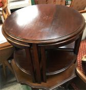 Mid Century nest of tables with large coffee table and four corner tables under.