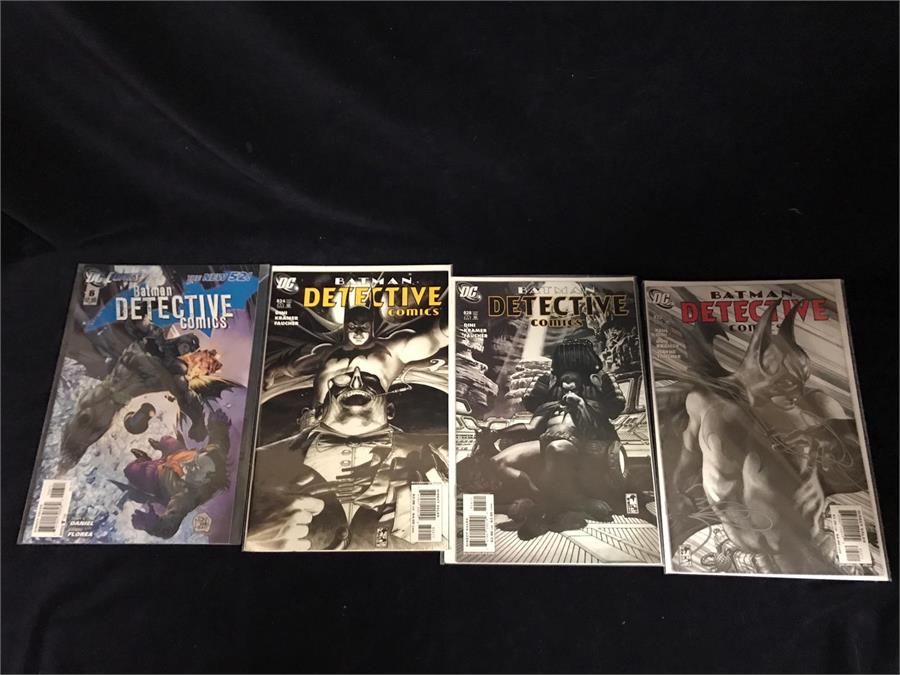 A selection of Four Batman Detective Comic, Oct 2006, April 2012, April 2007 and Dec 2006.