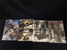 A selection of Four Batman Detective Comic, Oct 2006, April 2012, April 2007 and Dec 2006.