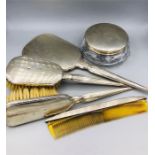 A Birks Canada dressing table set to include two brushes, a comb, mirror and silver topped glass
