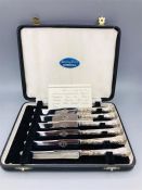 A Boxed set of six Sterling silver handled butter knives, Sheffield 1964