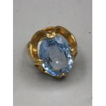 A 9ct yellow gold Aquamarine style ring