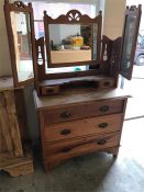 A Dressing table in pine with tri fold dressing mirror with two small drawers under, three main