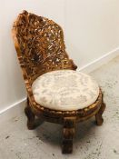 A Persian style carved chair