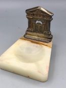 A hallmarked silver Grosvenor House ashtray in marble.