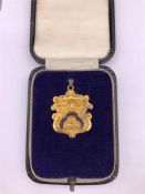 A 9ct gold Medal from the Order of the Buffaloes