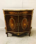 A French style cabinet with marble top.