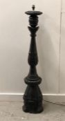 A Large black ebonised lamp base.