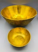 Two Oriental Brass bowls.
