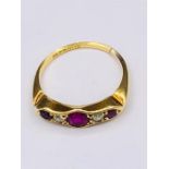 A Ruby and Diamond 18ct yellow gold ring (3.3g)