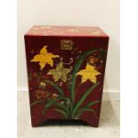 A Chinese lacquered cutlery cabinet with bird design