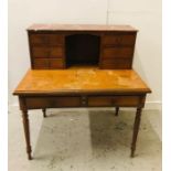 A Two drawer desk with additional drawers above and marble top