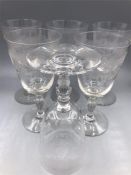 A set of six etched wine glasses or rummers.