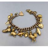 A 9ct gold charm bracelet (24g)