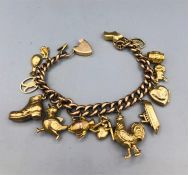 A 9ct gold charm bracelet (24g)