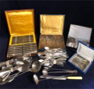 A large volume of silver plated cutlery.