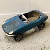 A Vintage E-Type Jaguar pedal car, in blue.