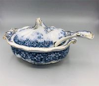 A blue and white china soup tureen with original china ladle.