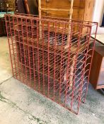 A large wrought iron wine rack