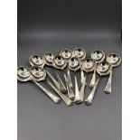 A set of twelve Sterling silver spoons
