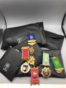 A selection of regalia and medals from the Order of Buffaloes, including hallmarked silver medals