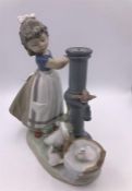 Lladro figure of a young girl at a water pump with a goose