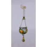 A silver and enamel set pendant necklace