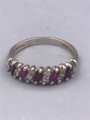 An 18ct white gold ruby and diamond ring (4g)