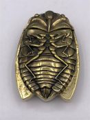 A Brass cased Vesta in the form of a bug
