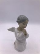 Lladro figure of a praying boy or angel
