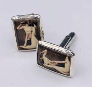 A Pair of silver and enamel set cufflinks with nude scenes