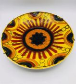 A Poole Pottery charger