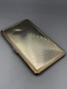 A hallmarked silver cigarette case.