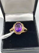 A 9ct Yellow gold and Amethyst ring