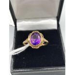 A 9ct Yellow gold and Amethyst ring